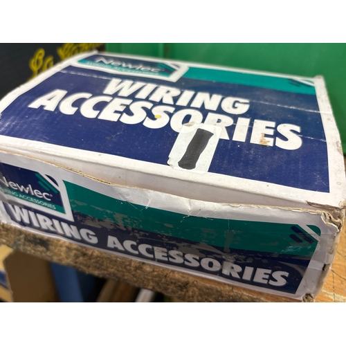 New box of bulb holders with brass and metal interior contacts