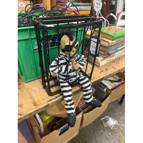 animated skeleton prisoner in a black cage wearing a black-and-white ...
