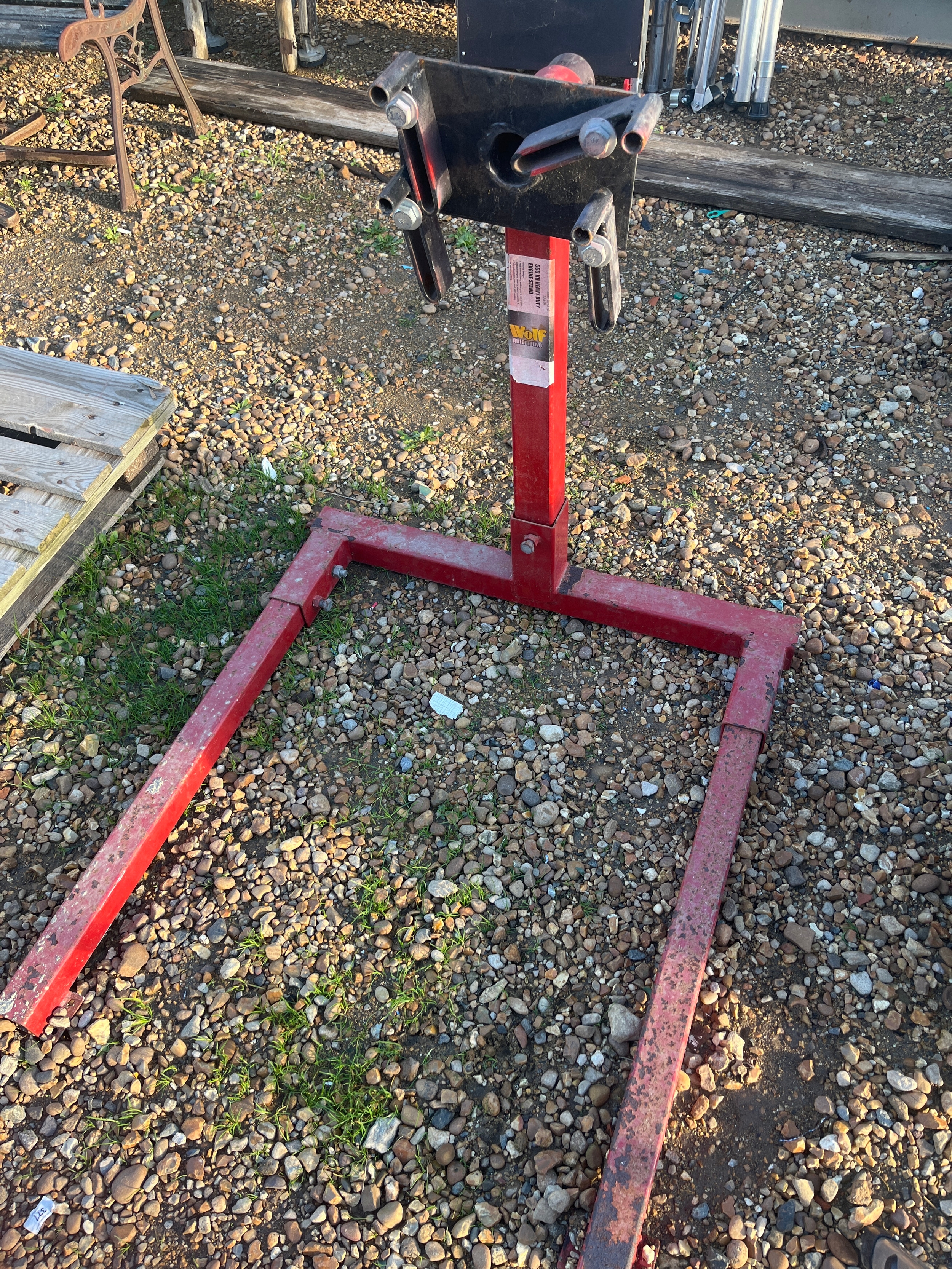 red metal 500kg engine stand used to mount, rotate, and hold a car ...