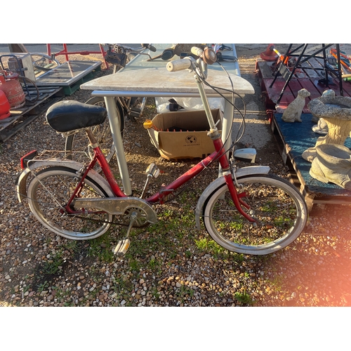 vintage red Italian folding or small-wheel commuter bicycle from the ...