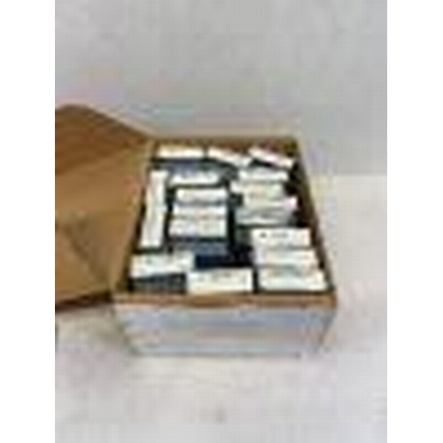 325 - A box containing 17 boxes of chokes, knobs, trimmers, bridge rects ferrite rods etc