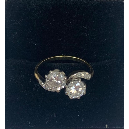 38 - A very good 18ct gold diamond crossover ring 1ct total diamonds, VS1 and L2 clarity both E colour 
 ... 