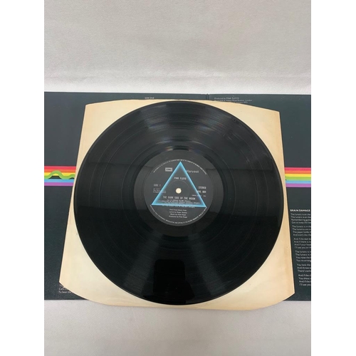 70 - Pink floyd , dark side of the moon 2 posters mint and post card . Vinyl VG + sleeve EX +