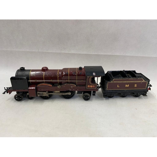 454 - Hornby 0 Gauge no.6100 clockwork 4-4-2 engine & 6 wheel tender in Maroon for LMS 
 Condition 3 
 620