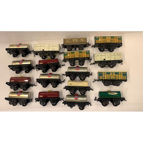 126 - Hornby for Hachette. 17 tin plate freight 0 Gauge rolling stock, tankers, open goods and box cars 
 ... 