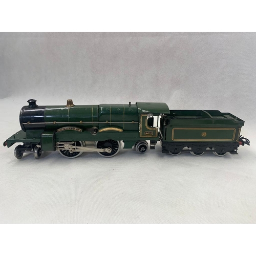 437 - Hornby 0 Gauge clockwork 4-4-2 Caerphilly Castle No. 4073 in Green Livery with 6 wheel tender 
 Cond... 