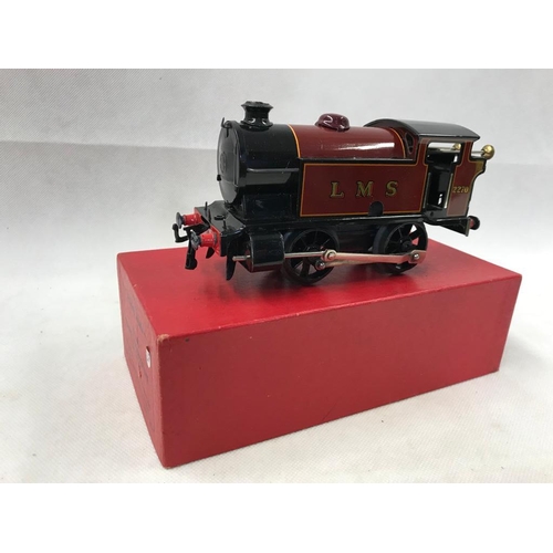 440 - Hornby 0 gauge clockwork 4 wheel reversing loco no. 40 unmarked with original paperwork and key 
 Co... 