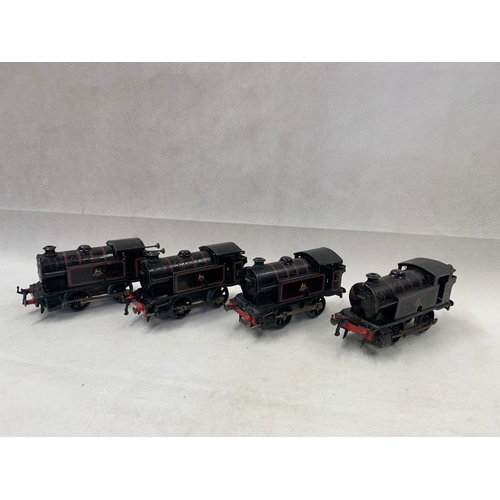 458 - Hornby 0 Gauge Clockwork 4 x tank engines 0-4-0 number 82011 in BR black 
 Condition 4 
 624