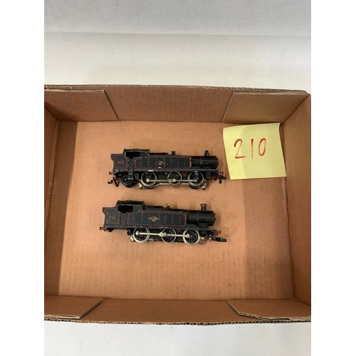 388 - 2 x TRIX GWR 66XX 6664, missing trailing wheels, playworn 
  
 210