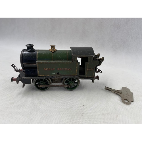 426 - Hornby 0 Gauge clockwork 0-4-0 tank engine no.6600 in GWR Green, paint wear, minor dings 
 Condition... 