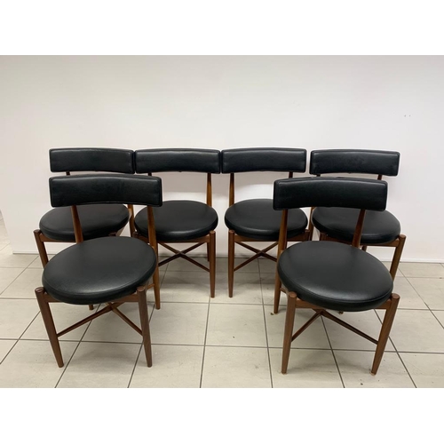 A set of 6 GPlan dining chairs with original black vinyl seats and