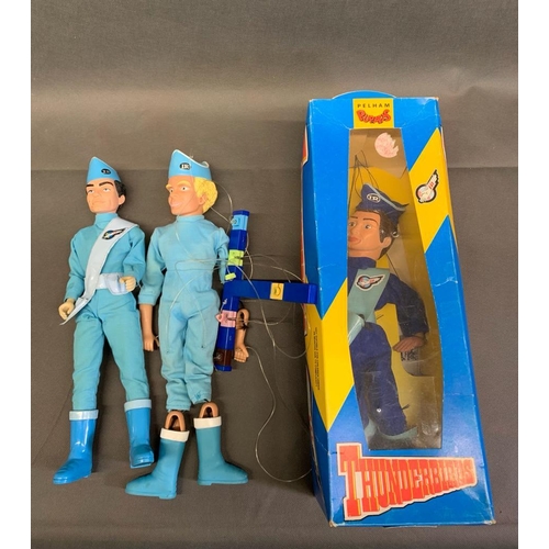 17 - A Carlton Thunderbirds doll together with a Thunderbird puppet of Alan and a Pelham Puppets boxed Th... 