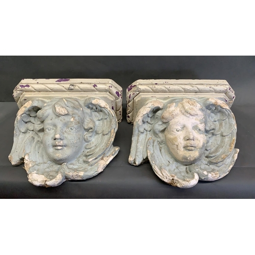 2 - 2 antique French plaster cast corbels in the form of cherum faces, adorned with angel wings