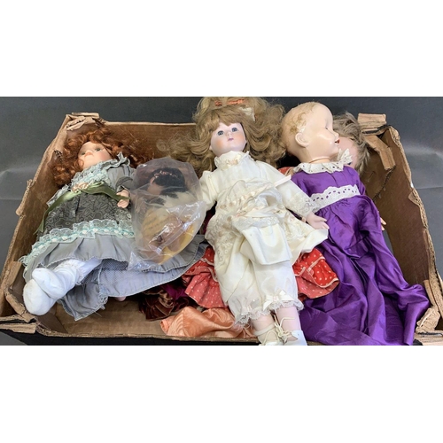 27 - A collection of vintage plastic and china dolls