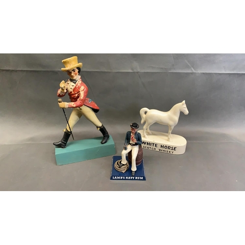 6 - A vintage Johnnie Walker advertising model, together with Lambs Navy Rum and a Whitehorse Scotch Whi... 