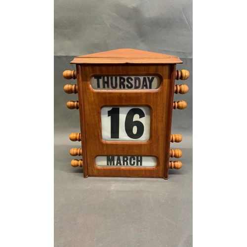 7 - An early 20th century day/date perpetual calendar, in mahogany, in fully working order and fine cond... 