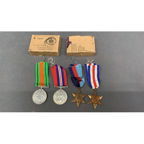 97 - A collection of 4 WW2 service medals