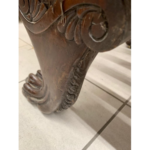 252 - A very interesting antique settee with scroll arms, brass inlays and carved claw feet, supported on ... 