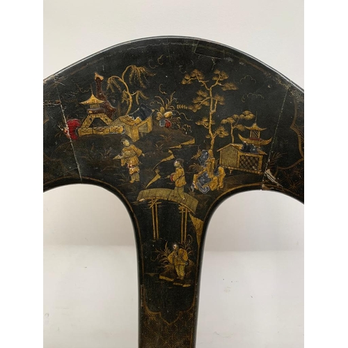 257 - A beautifully carves chinoiserie eighteenth century black lacquered chair