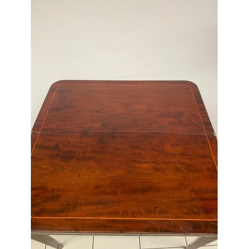 264 - An antique mahogany card table