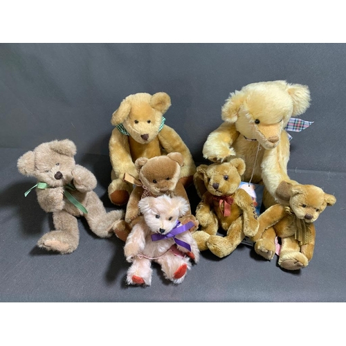 30 - A collection of 7 small jointed bears