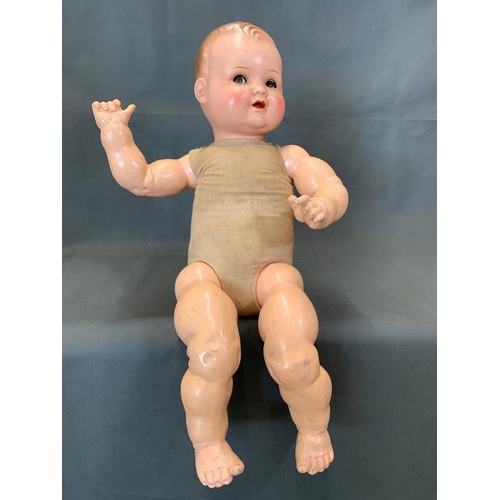 37 - A large vintage doll 66cm long