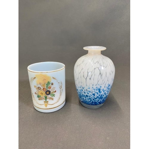 40 - A splash blue and white vase and an opaque glass cup