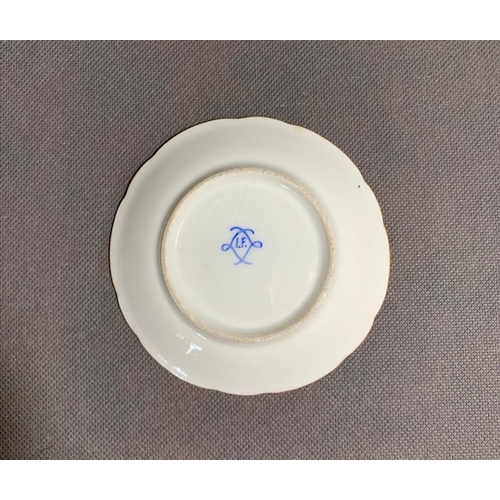 148 - A 19th century saucer in the style of Sevres