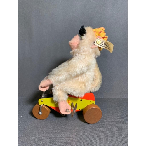 19 - A Steiff Monk king 1925 replica monkey on a bike .00159 of 1200 pieces