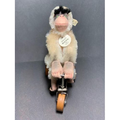 19 - A Steiff Monk king 1925 replica monkey on a bike .00159 of 1200 pieces