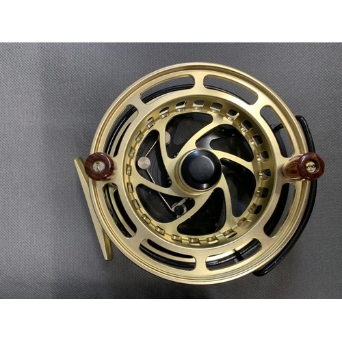 62 - Holland and Wilkinson '' The Golden Retriever'' 4 1/14 super highly ventilated fishing reels with ex... 