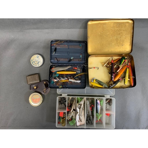 140 - Lures, spinners, flys in tin and plastic cases