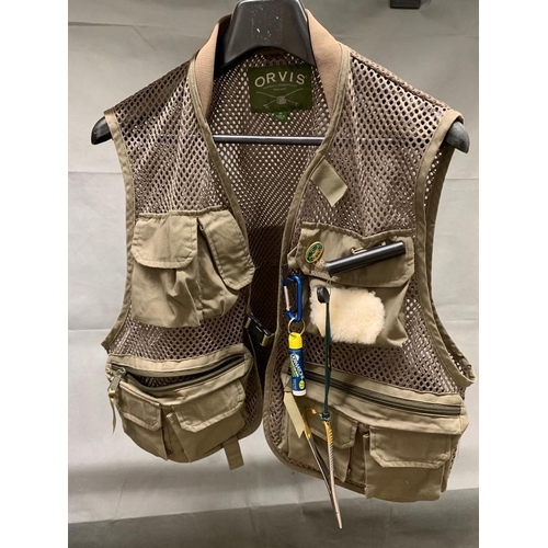 149 - Orvis trout fishers vest, medium size filled with some tools etc, good cond.