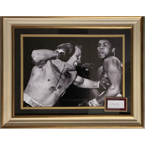 175 - A large photograph of Henry Cooper and Mohammad Ali with Henry coopers signature