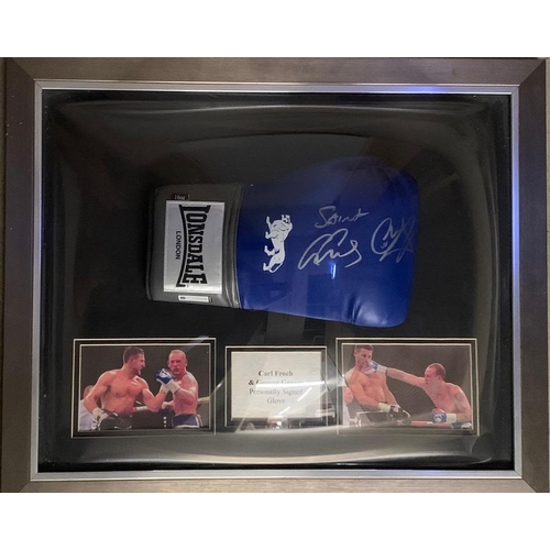 176 - A signed boxing glove in dome frame, signed by Carl Froch and George Groves