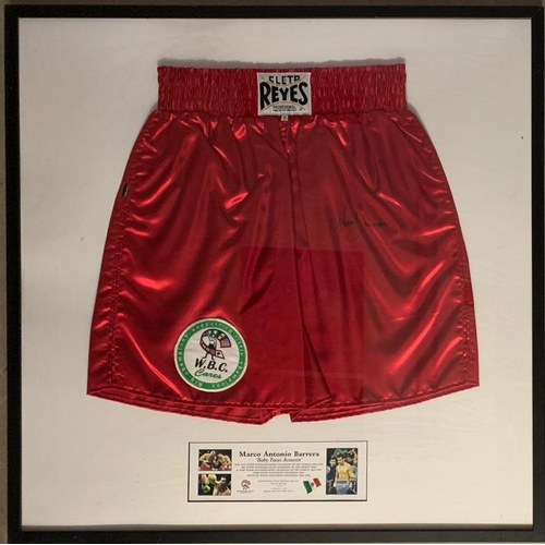 177 - A pair of signed boxing shorts by Marco Antonio Barrera framed and glazed