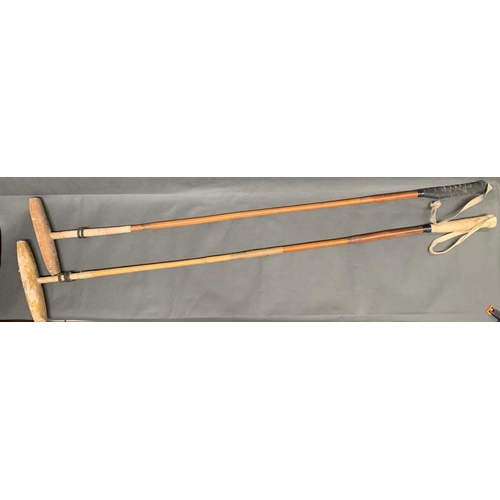 190 - Two vintage polo sticks