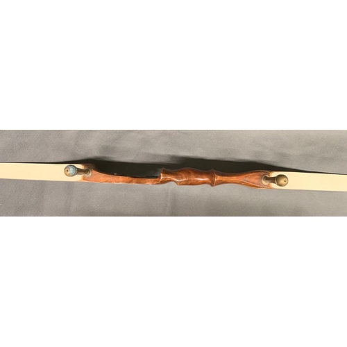 193 - An Olympic recurve bow (Not strung), length 160cm. 1970's period