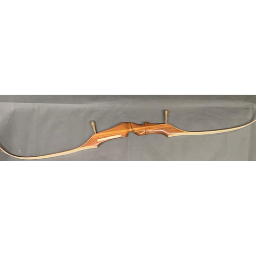 193 - An Olympic recurve bow (Not strung), length 160cm. 1970's period