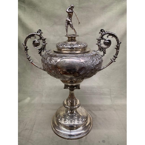 195 - An exceptional antique golfing trophy.  
  
 The Trophy made by Mappin and Webb is sold silver and w... 