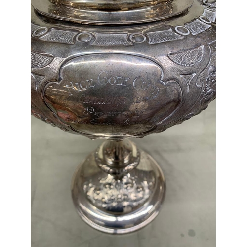 195 - An exceptional antique golfing trophy.  
  
 The Trophy made by Mappin and Webb is sold silver and w... 