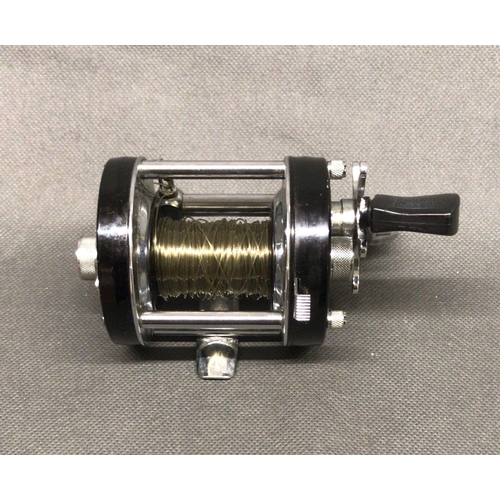 21 - ABU Ambassadeur fishing reel 6000 C multiplier finished in black, good condition. No .731002 in blac... 