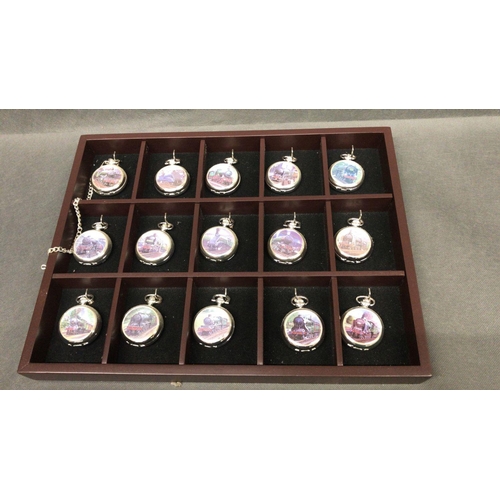 213 - A collection of 31 pocket watches with Steam locomotive images on front of cases in 2 display boxesd