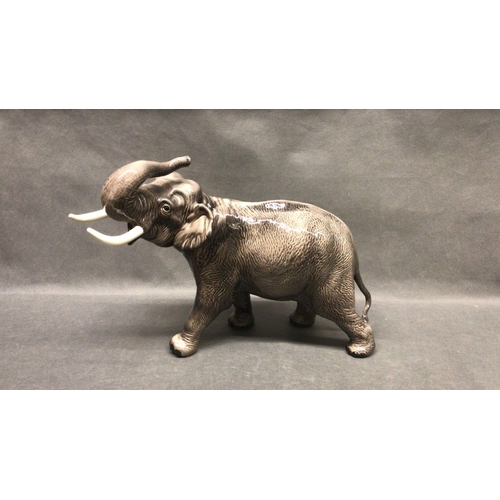 216 - A large Beswick Elephant in excellent condition, approximately 30cm high x 40cm