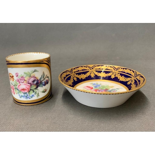 225 - A Sevres in beau blue palette and gold cup and saucer with floral decoration, dates circa 1754 and 1... 