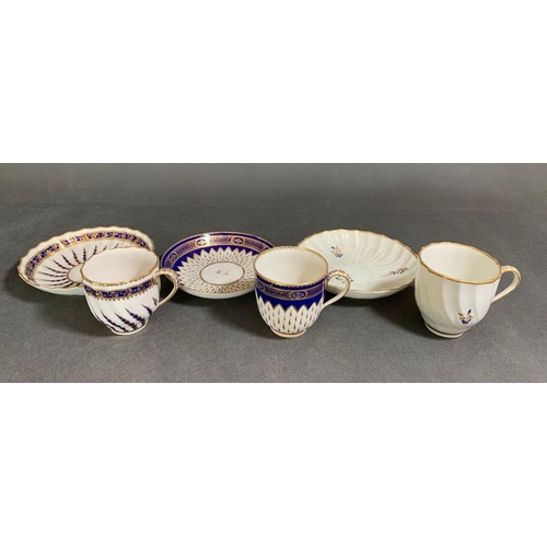 229 - Three Eighteenth Century Royal Crown Derby Tea cups and saucers, decorated in blue and gold