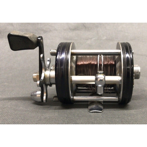 24 - ABU Ambassadeur 6000 C multiplier fishing reel in black with black leather box and oil bottle. No 72... 