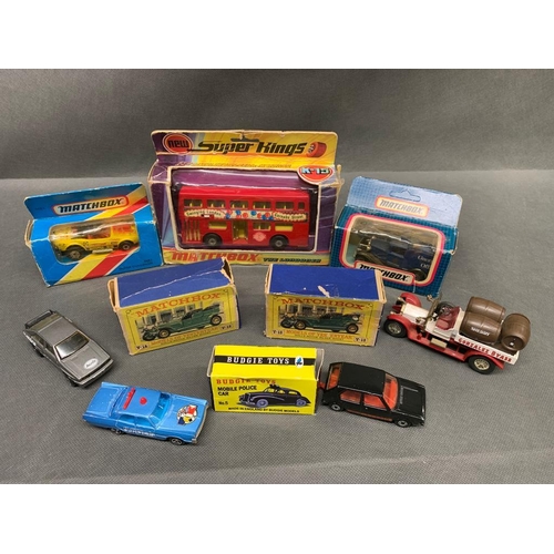 255 - A group of 10 matchbox and others cars £10-£15 Including a majorette Plymouth fury police car