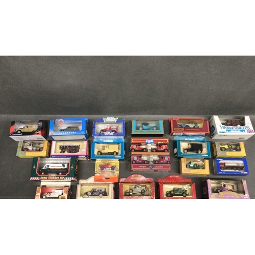 270 - Collection of 21 vintage and commemorative vehicles including Corgi and Matchbox