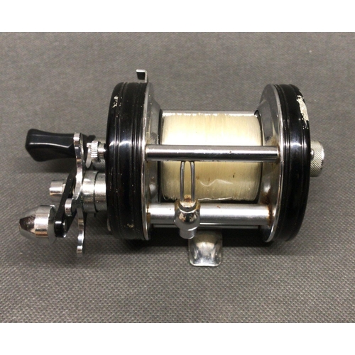 32 - ABU Ambassadeur 6000 C Multiplier fishing reel finished in black, 1 small scrape to rim otherwise go... 